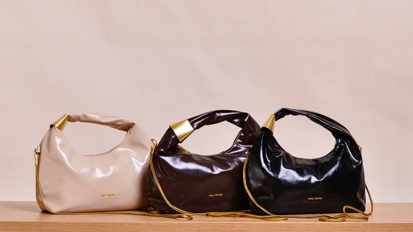 Tasche Vetys – Statement Hobo Bag mit goldenem Detail