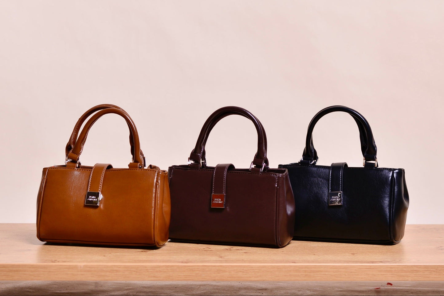 Tasche Vvarye – Elegante Mini-Handtasche mit klarer Silhouette