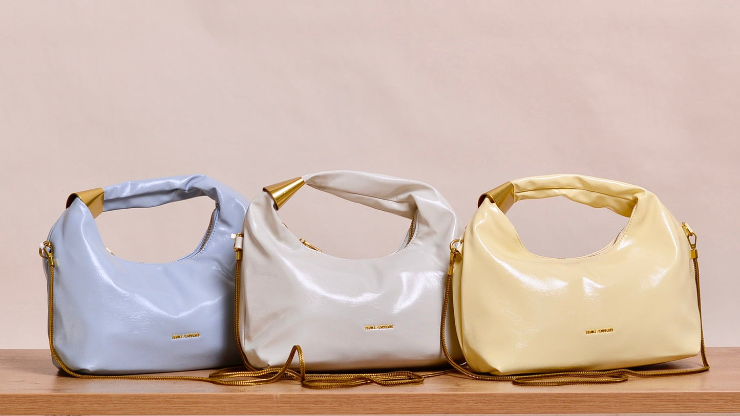 Tasche Vetys – Statement Hobo Bag mit goldenem Detail
